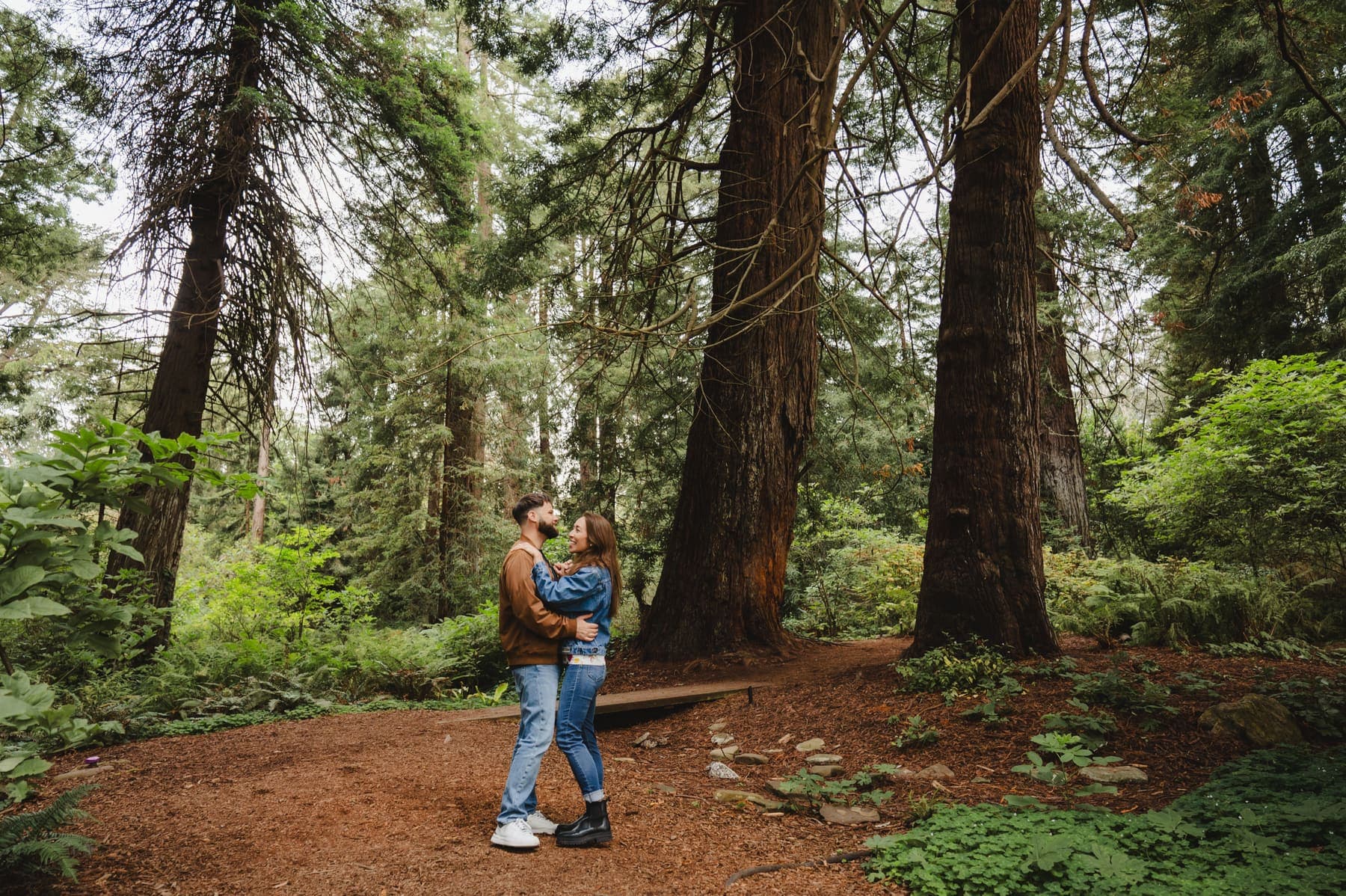 Rebecca and Shawn among the redwoods after the proposal